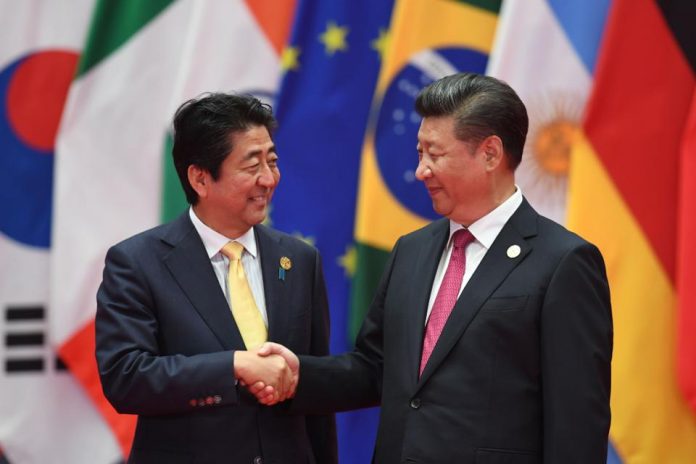 Japanese Prime Minister Shinzo Abe and Chinese President Xi Jinping