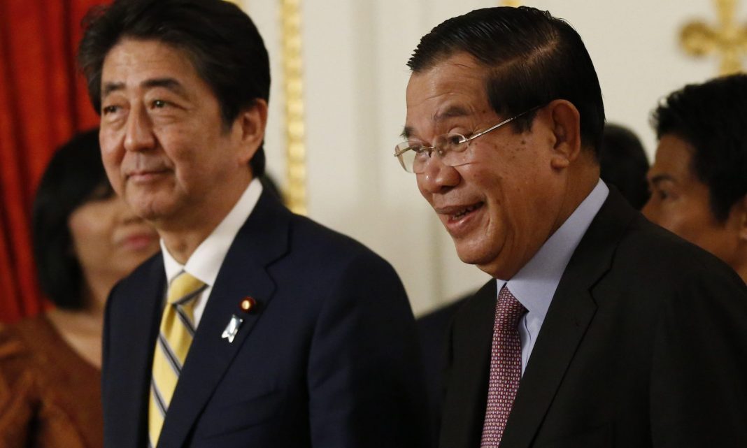 Japanese Prime Minister Shinzo Abe and Cambodian PM Hun Sen