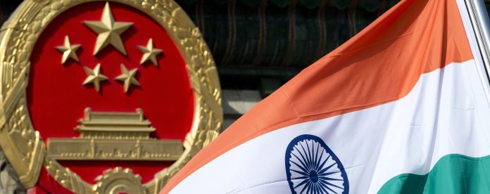 Indian national flag and the Chinese national emblem