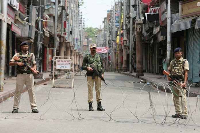 Soldiers in a street in Kashmir