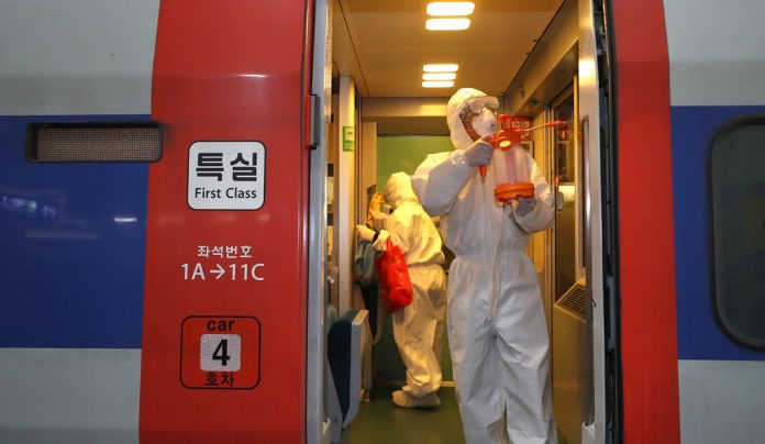 Spraying disinfectant in South Korean Train