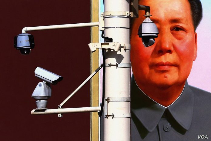 1024px Maos portrait and surveillance cameras at Tiananmen